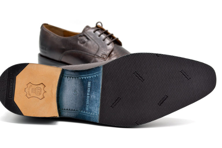 Herrenschuh besohlt mit nora Classic Absatz und Contilit Schonsohle