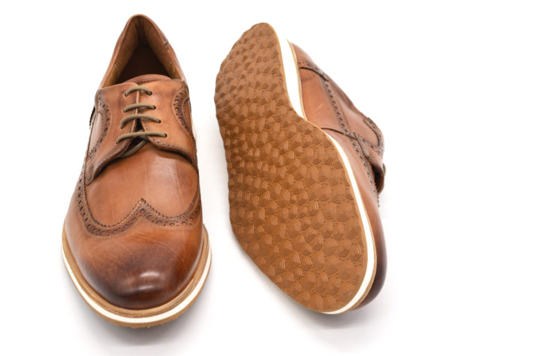 Lederbraune Herrenschuhe besohlt mit Astral Profil Geo