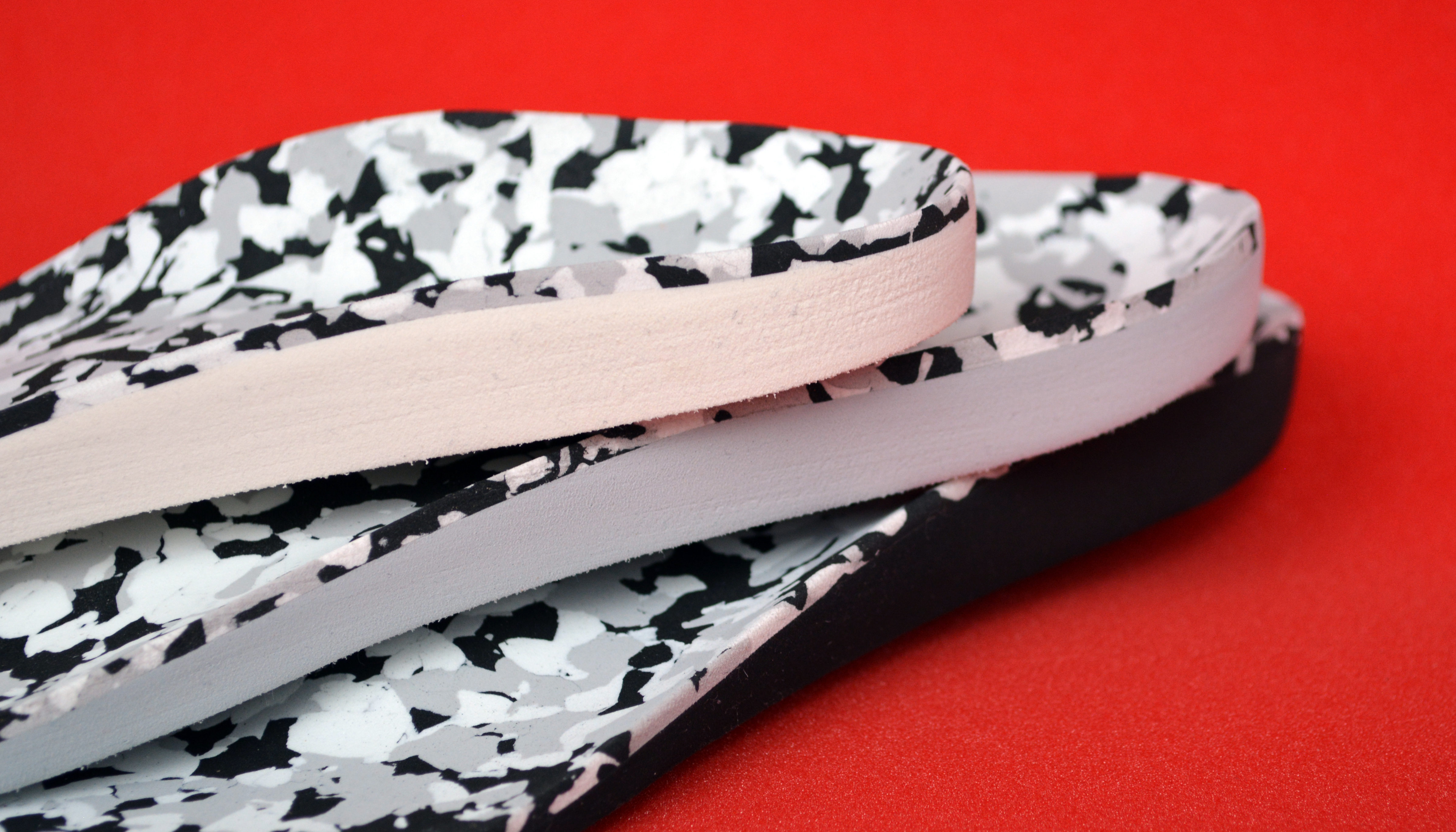 Einlagen aus nora Materialien mit Deckschicht Lunasoft SL in camouflage